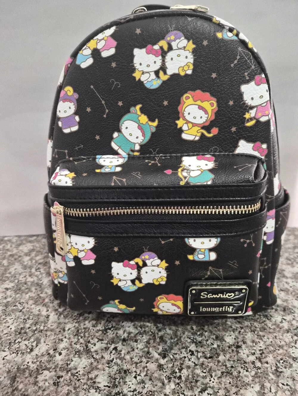 Loungefly Hello Kitty All Over Print Mini Backpack.